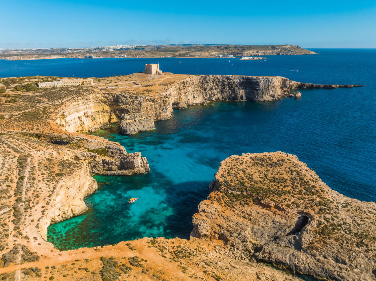 The Crystal Lagoon with a view of Santa Marija tower.