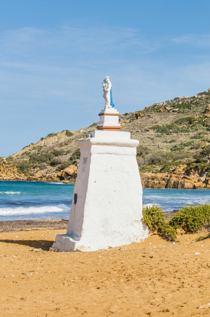 The statue on the beach at Ramla Bay, Gozo.