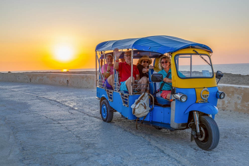 Sunset Tuk Tuk tour on the road in Gozo.